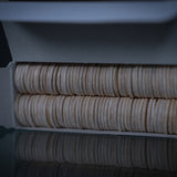 an open box of 100 tongue depressors used to apply petroleum jelly in the tattooing process by tattoo artists.